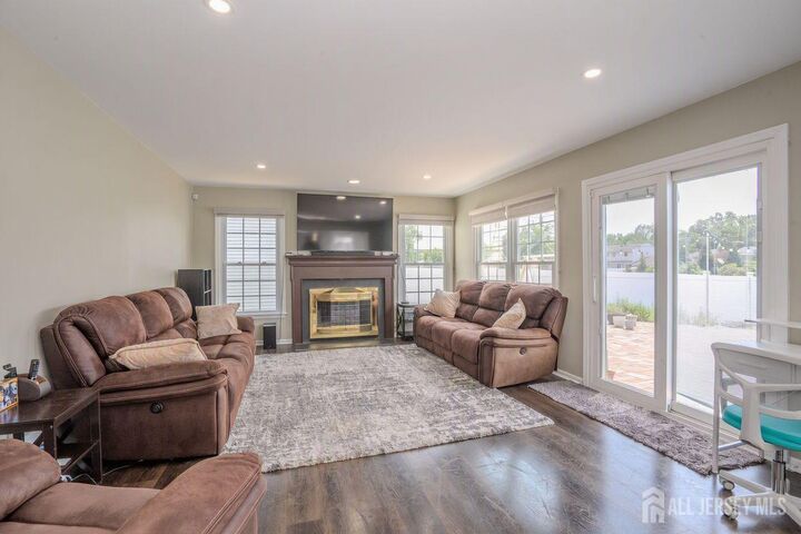 The living room at 1444 Masoma Road, North Brunswick, a featured property of CENTURY 21 Gloria Zastko Realty
